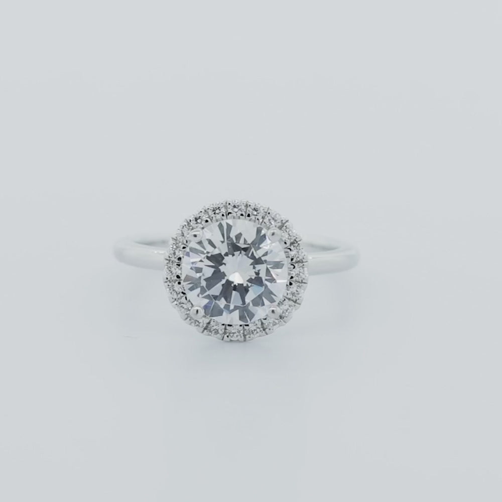 
          
          Load and play video in Gallery viewer, Linn Moissanite Round Natural Diamonds Halo Solitaire 18k White Gold Ring In Stock
          
          