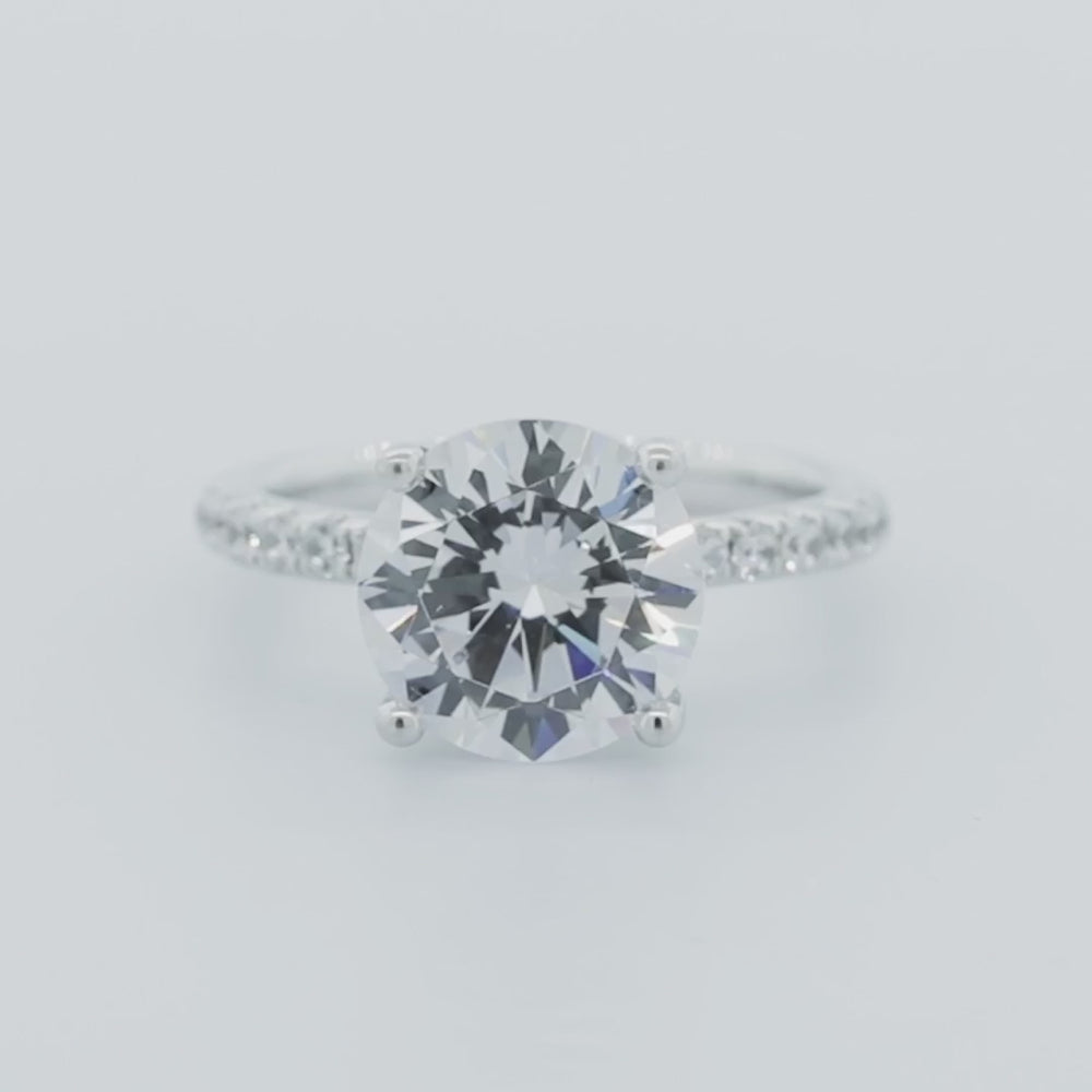 
          
          Load and play video in Gallery viewer, Amalia Moissanite Round Pave Natural Diamonds 18k White Gold Ring In Stock
          
          