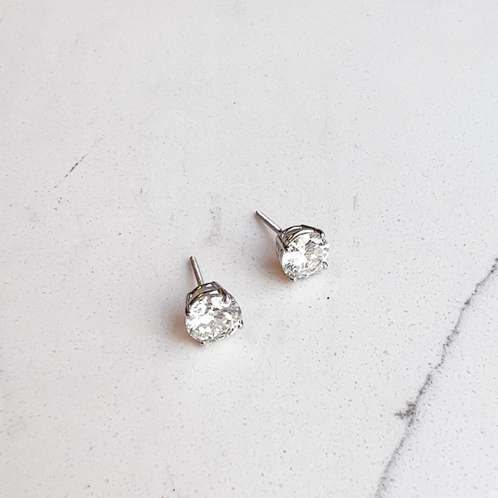 
          
          Load image into Gallery viewer, Lab Created Diamond Round Solitaire Stud Earrings
          
          